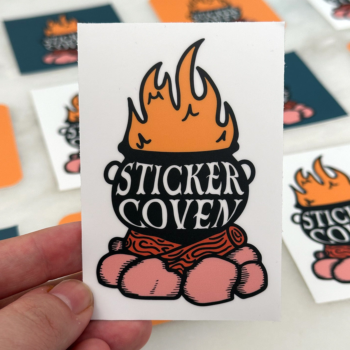 rectangle sticker with cauldron logo